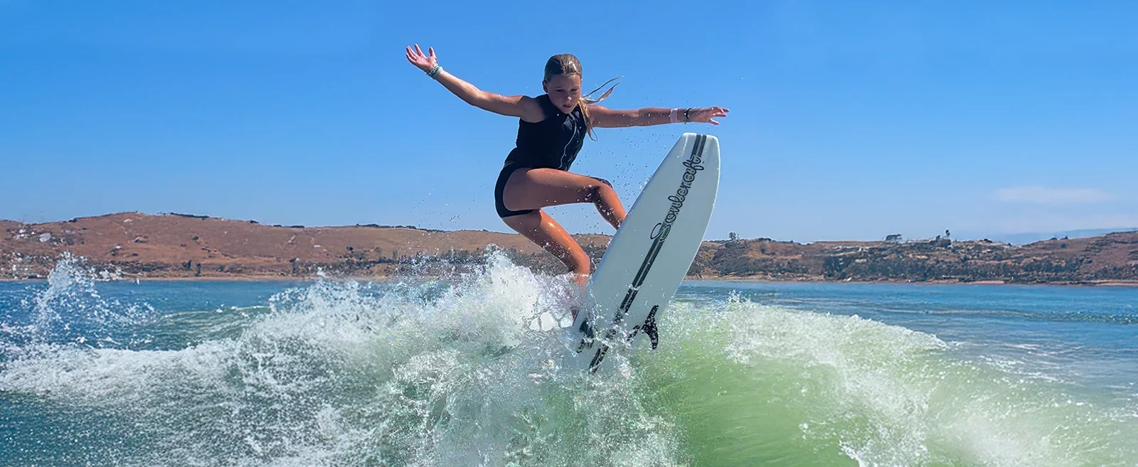 Bostyn Hall executing surf trick