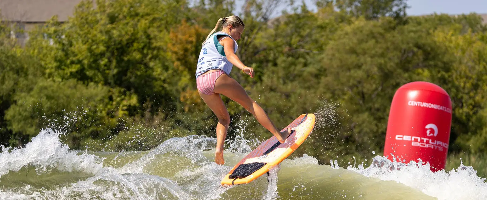 Bynlee Hall executing surf trick